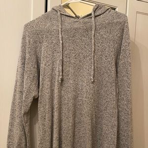 Gray pullover hoodie with string ties.